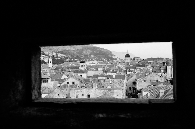 scene-of-old-town-dubrovnik-through-a-stone-window