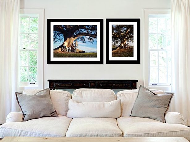 Lounge room displaying four wall art pieces of family photography