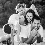 Family-playing-pile-ons-at-gold-coast-beach-family-photography
