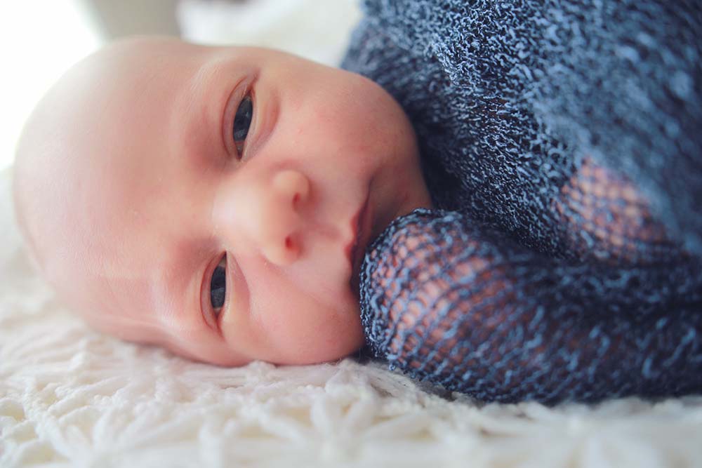 Newborn-Photography-beautiful-Newborn-baby-with-eyes-open-Photographer-gold-coast