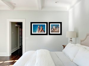 bed room displaying family photography wall art