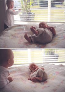 Big-brother-having-a-moment-with-little-brother-gold-coast-newborn-photographer
