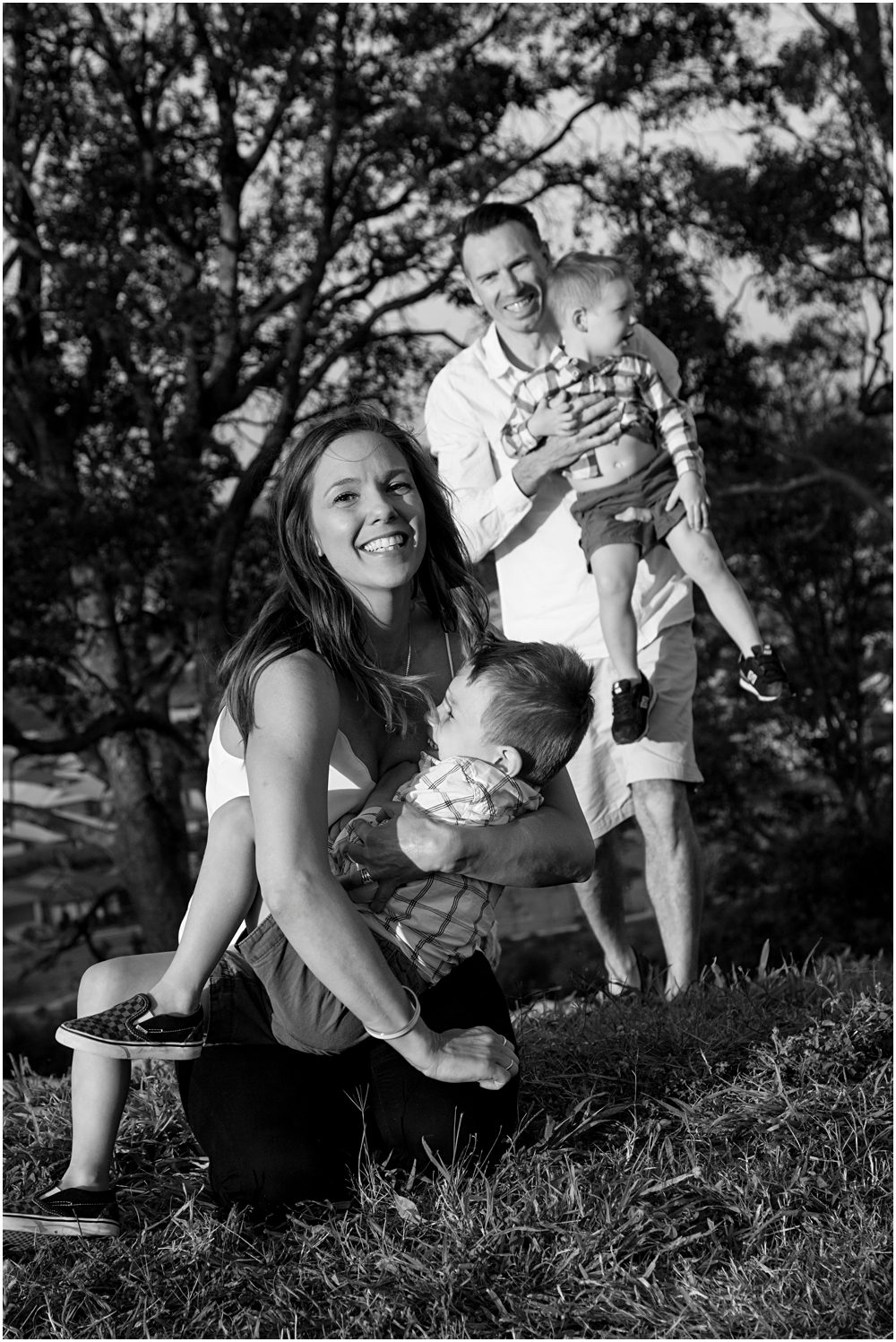 Parents-chasing-and-tickling-their-children-gold-coast-hinterland-family-photography