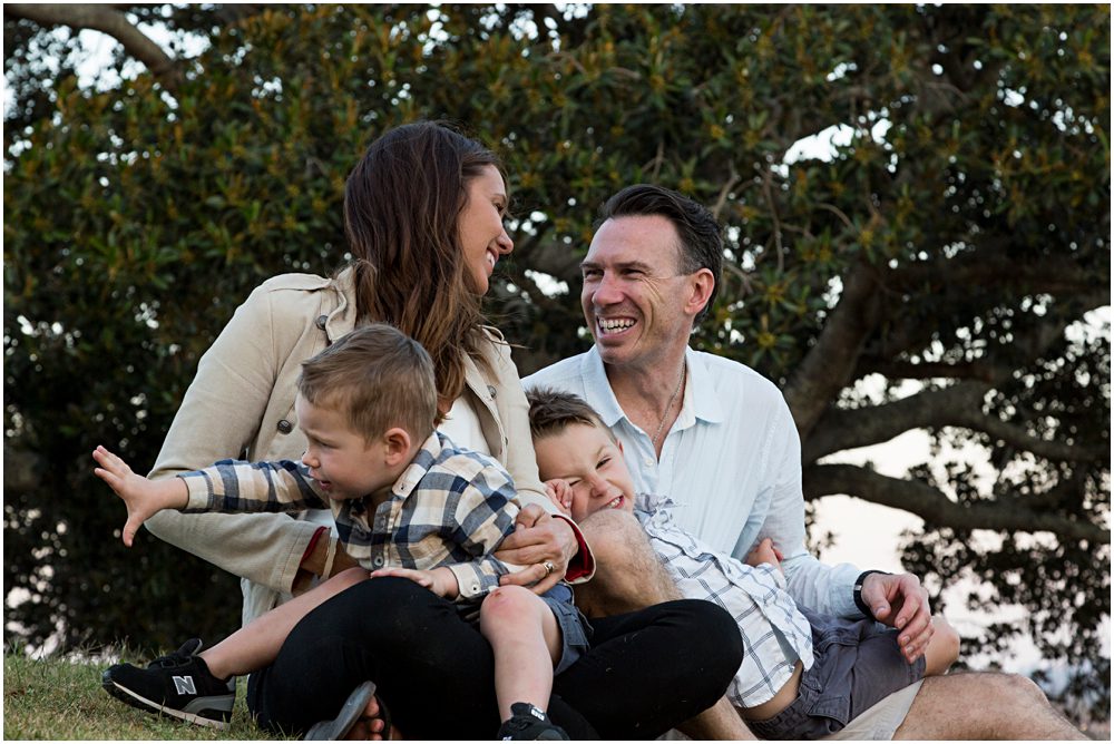 family-playing-in-the-park-parents-laughing-at-crazy-of-kids-family-photography-candid-gold-coast