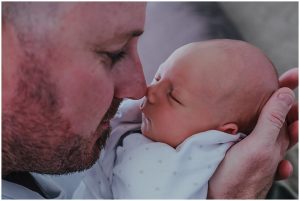 dad-eskimo-kisses-nose-to-nose-with-newborn-son-gold-coast-family-photographer