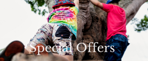 back-image-of-Kids-climbing-a-tree-wearing-tie-dye