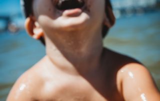 Toddler-laughing-and-having-fun-at-paradise-point-inlet-gold-coast