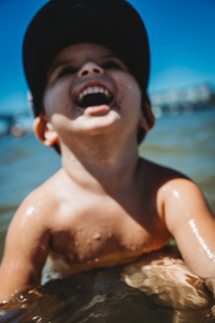Toddler-laughing-and-having-fun-at-paradise-point-inlet-gold-coast
