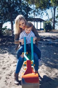 Mum-and-son-moment-playing-on-the-crane-in-the-sand-at-the-park-gold-coast-family-lifestyle-photography-feather-touch-photography