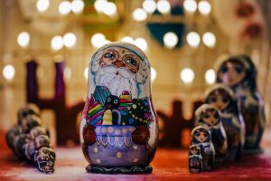 Beautiful-hand-crafted-santa-bubbushka-hand-painted-and-purchased-in-russia-on-display-with-xmas-lights